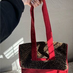 Bold Red Tote with Leopard Print and Structured Design